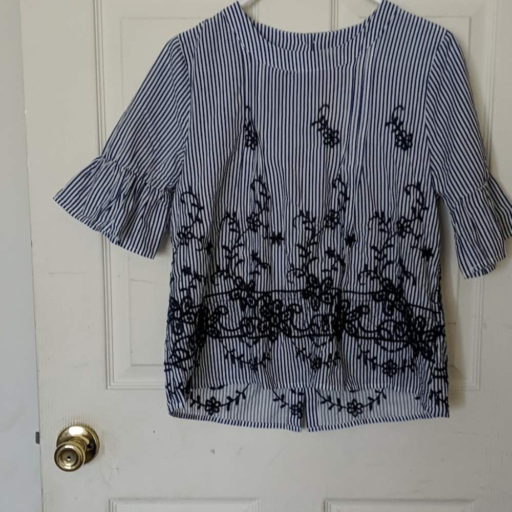 A blue and white striped top.